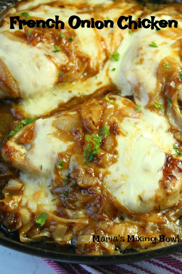 Close up of cheesy chicken in French Onion gravy in skillet