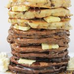Chocolate Chocolate Chip Pancake Stack with whipped butter tipping