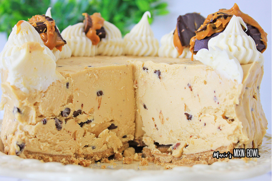 cheesecake with cream cheese frosting and peanut butter cups