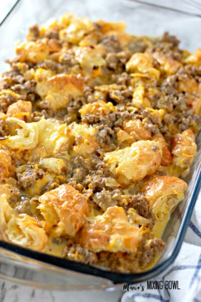 side view of breakfast bake in a 9x13 glass pan on counter