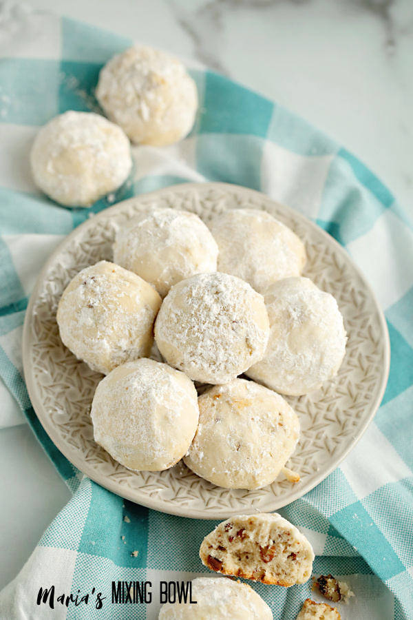 cookies on beige plate and blue and white check napkin