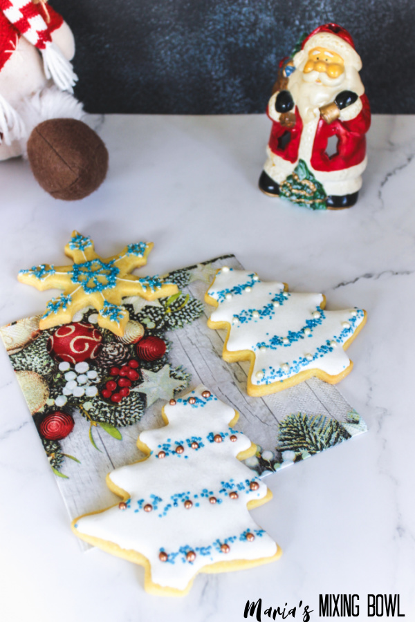 tree shaped , star shaped cookies on a marble couneter