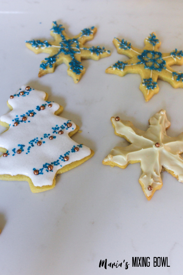 decorated cookies on a marble counter