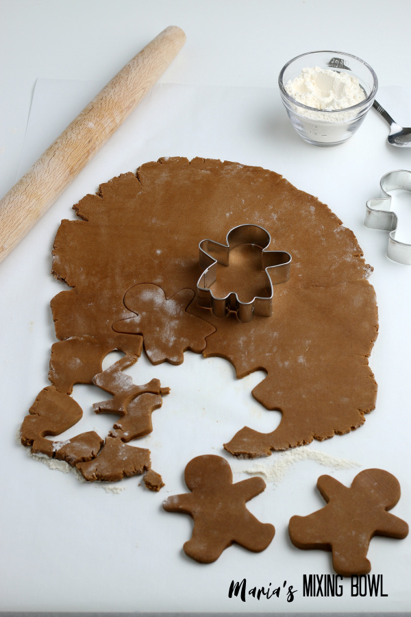 cutting out cookies rolling pin, flour spoon, cookie cutters