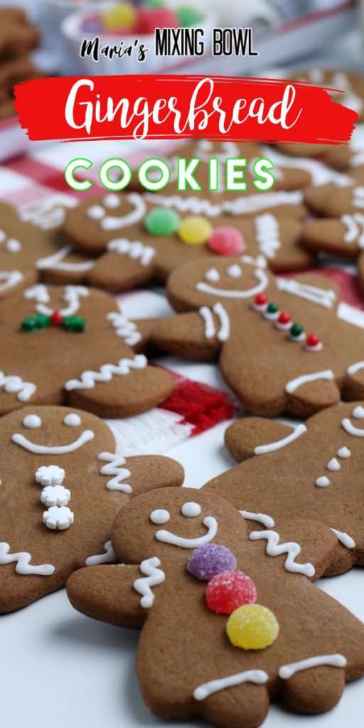 cookies with decorations on a white table cloth