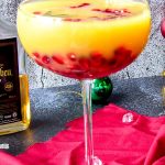 Drink for the holidays on a red napkin on black marble