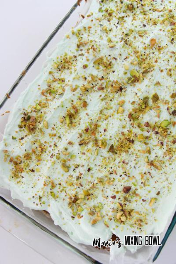 Easy pistachio cake in glass baking dish.