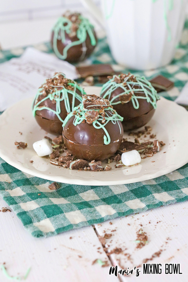  Mint and chocolate bombs on white plate