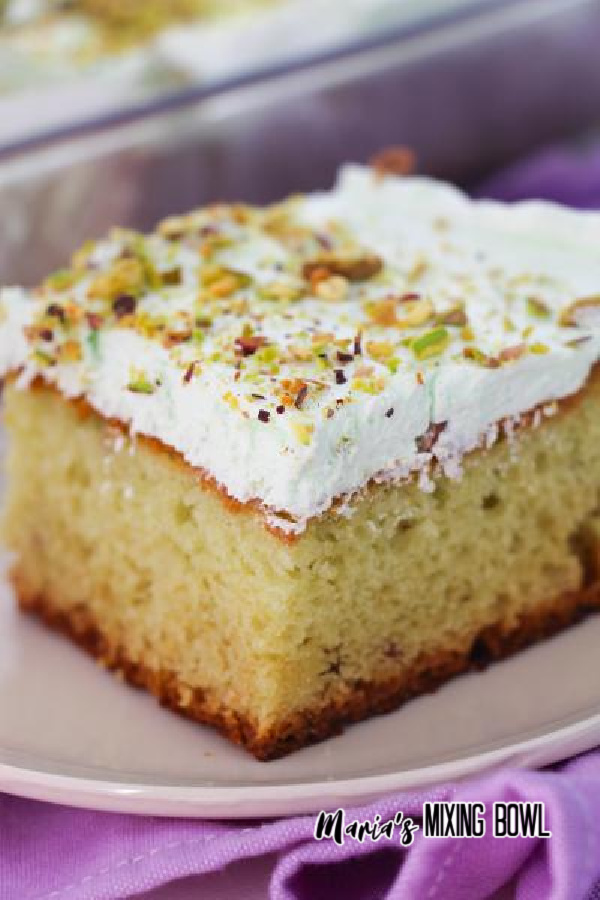 Closeup of cake on white plate.