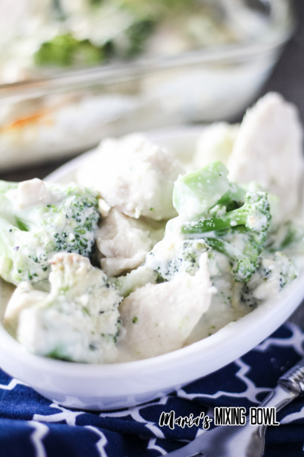 Closeup of chicken broccoli bake in white dish
