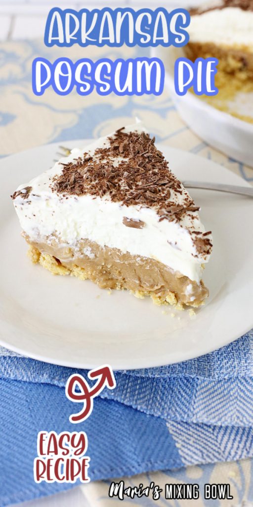 Slice of chocolate whipped cream pie on white plate with fork