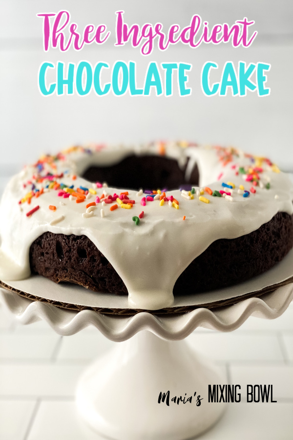 cake with sprinkles on white stand