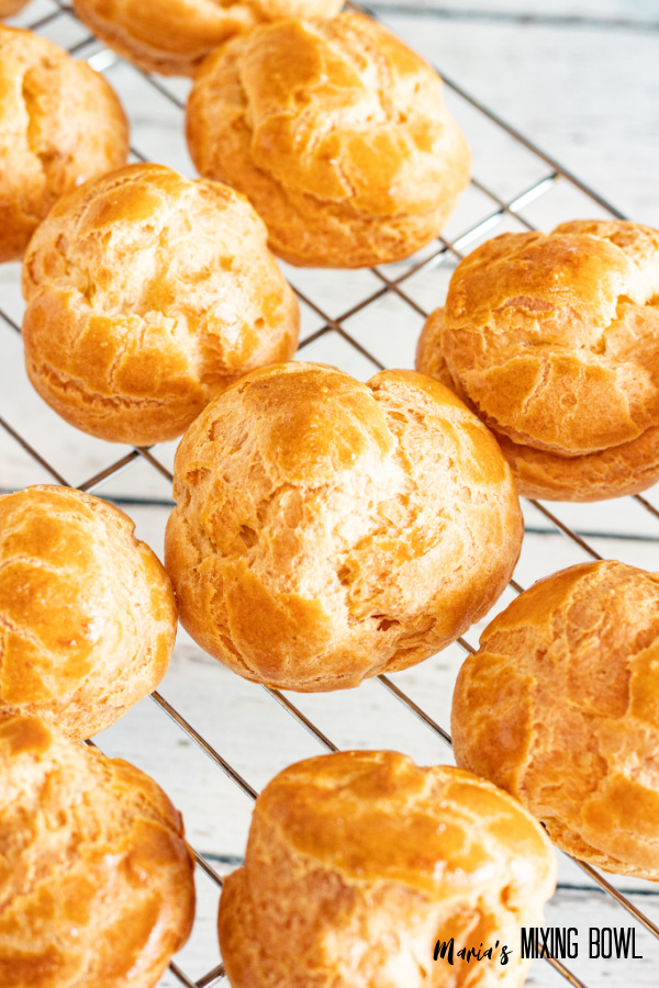 Baked puffs before cutting on wire cooling rack