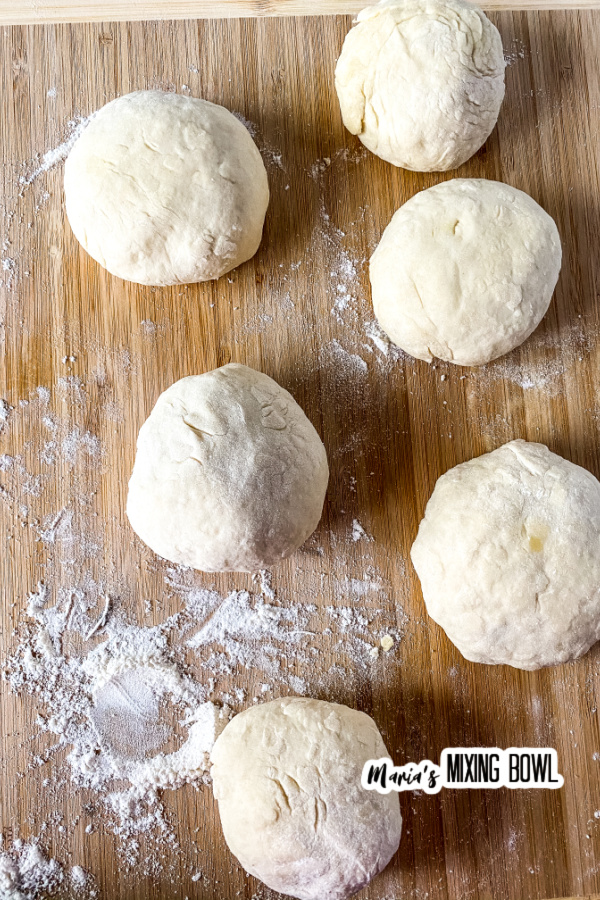 Homemade bagel recipe doughballs on wooden board