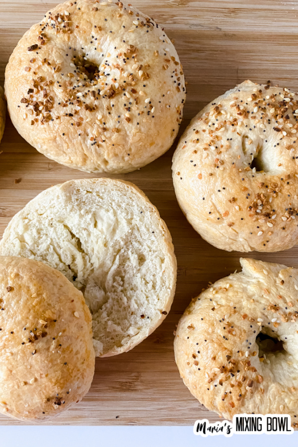 Closeup shot of bagels with one bagel cut in half