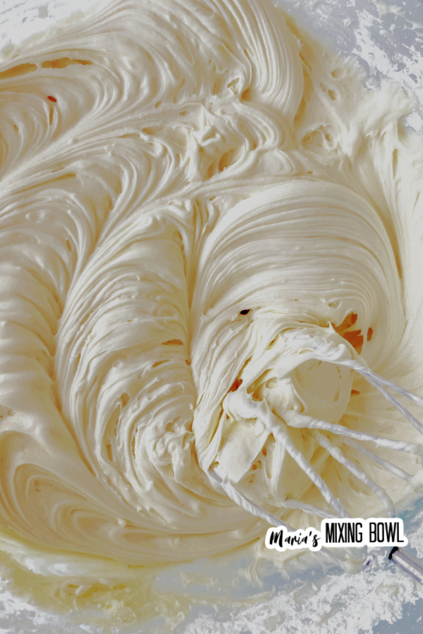 Closeup overhead shot of chantilly frosting being whipped
