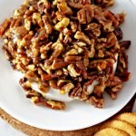 Cheese and pecan Spread on a white plate
