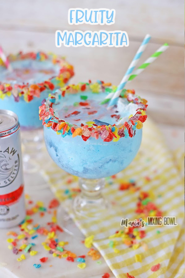 Closeup shot of fruity margarita garnished with Fruity Pebbles