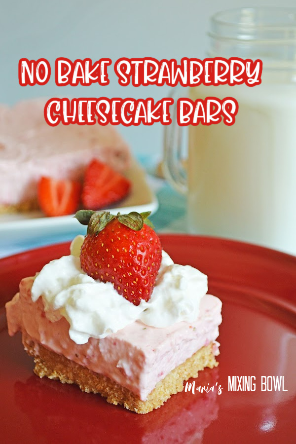 piece of no bake strawberry cheesecake bars on red plate