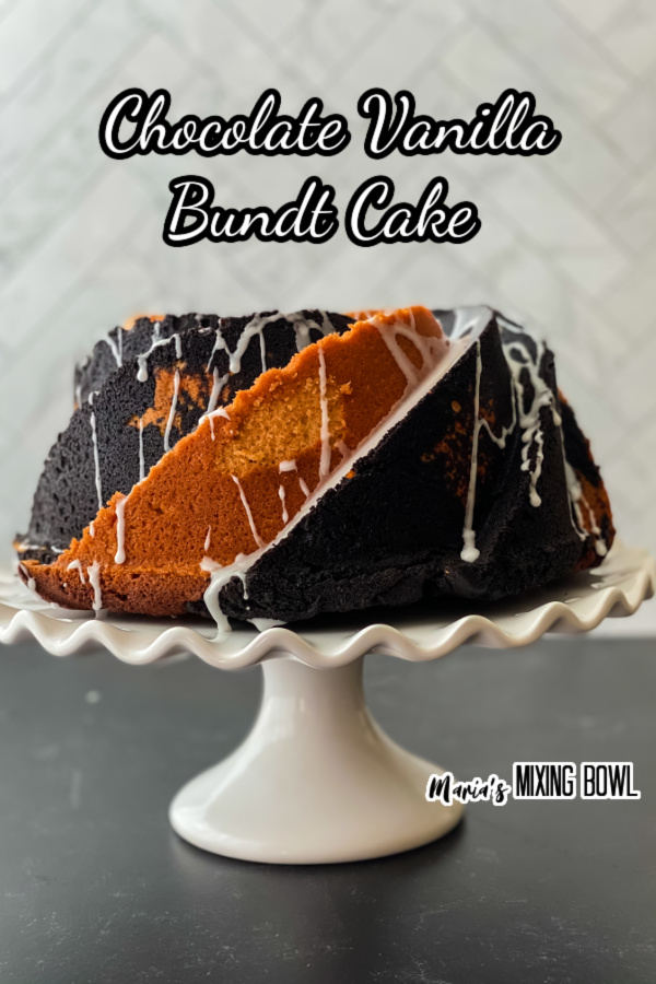 Chocolate vanilla bundet cake on white cake stand