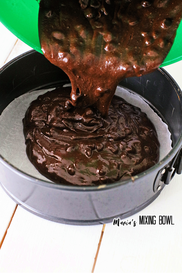 Pouring brownie batter into springform pan