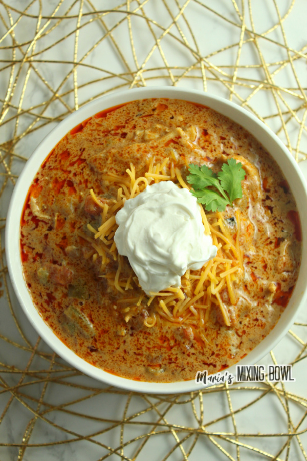 Soup with sour cream in a white bowl