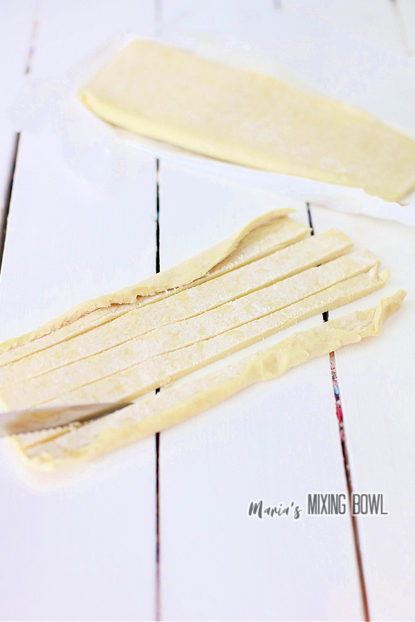 Pastry dough cut into strips.