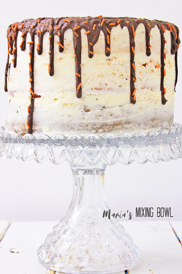 Frosted pumpkin spice latte cake on cake stand
