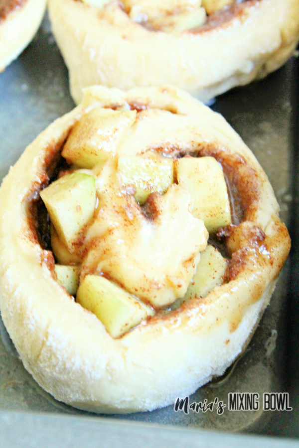 Closeup shot of caramel apple cinnamon rolls ready to be baked