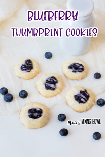 cookies on white board with blueberries