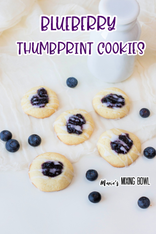 cookies on white board with blueberries