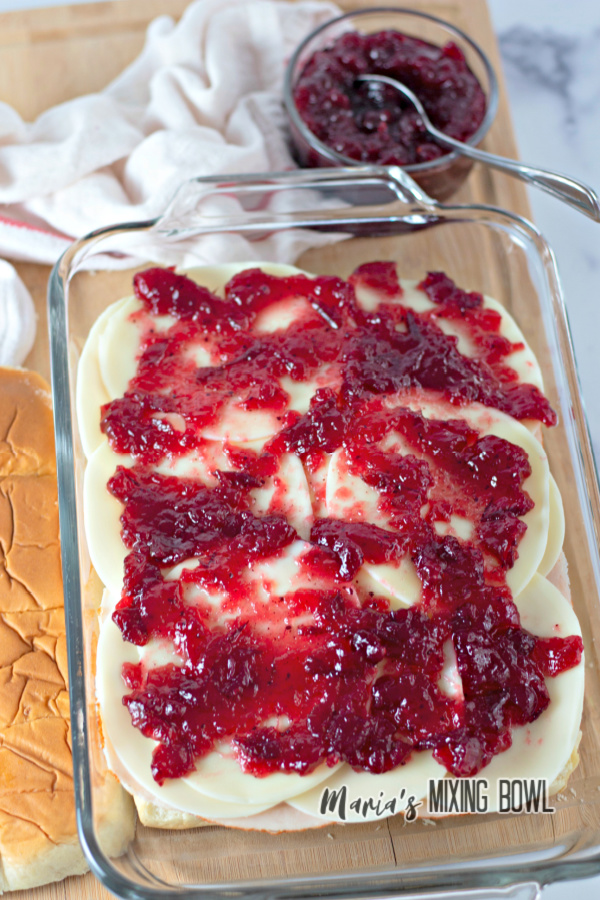 turkey cranberry sliders in a clear baking pan