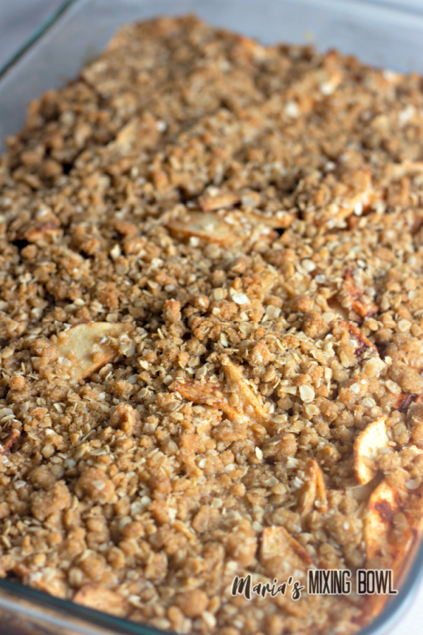 Closeup shot of double crumble apple crisp in dish
