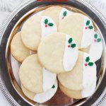 shortbread cookies decorated for Christmas on a serving tray