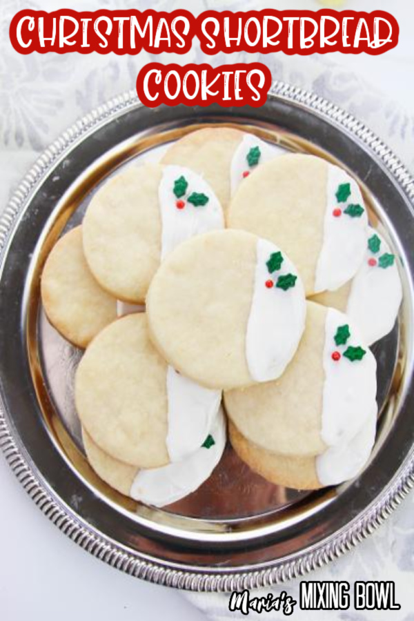 shortbread cookies decorated for Christmas on a serving tray