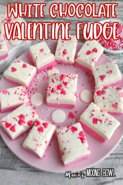 White Chocolate Valentine Fudge with sprinkles on a pink plate