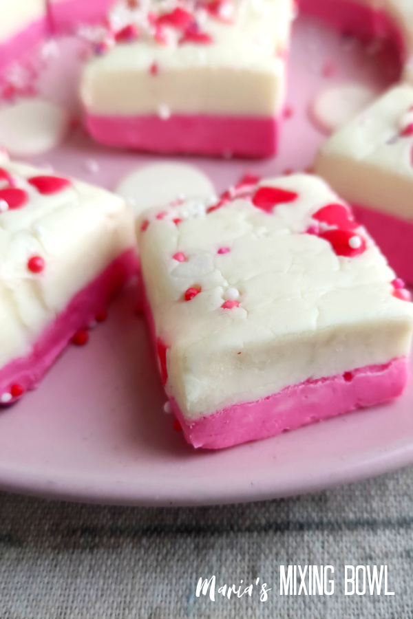 layered fudge on a pink plate