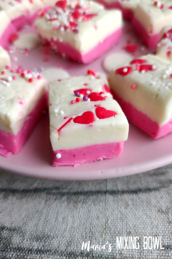 pink and white valentine fudge on a pink plate