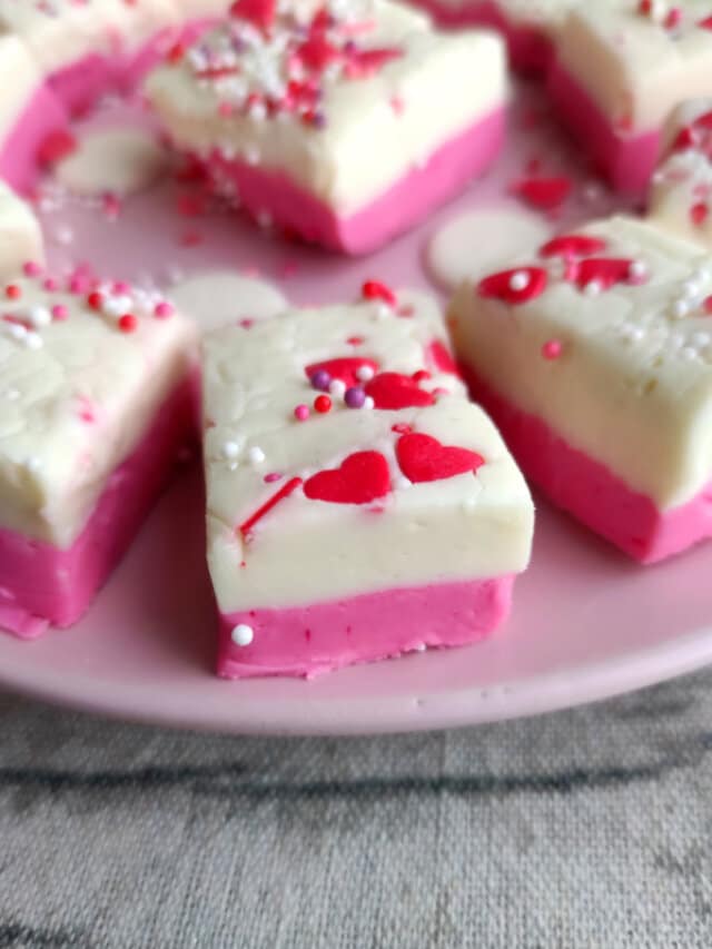 pink and white valentine fudge on a pink plate