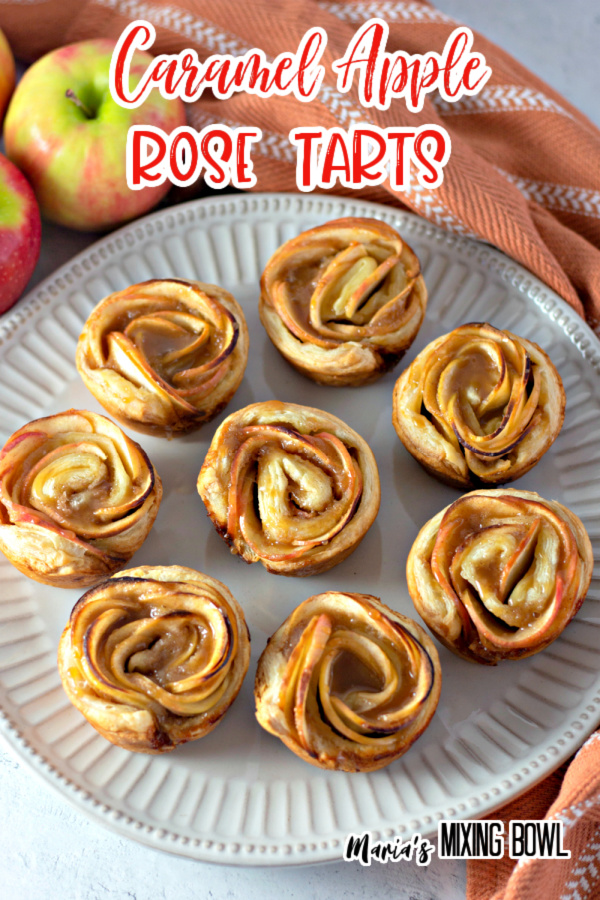 Overhead shot of apple rose tart puff pastries on serving plate