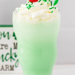 Shamrock Shake in a tall glass with a straw