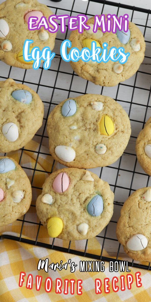 Easter Mini Egg Cookies on a cooling rack with a yellow and white napkin