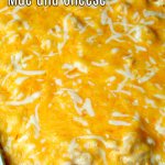 Creamy Baked Mac and Cheese in a light blue baking dish
