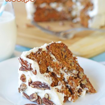 Carrot Cake Recipe slice on a white plate on a blue and white napkin