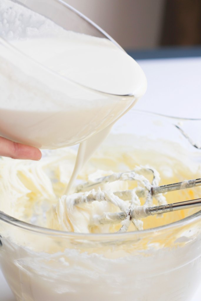 Frosting with beaters in glass bowl