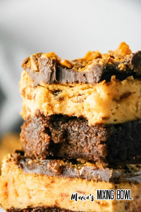 Closeup shot of butterfinger cheesecake bar with bite taken out