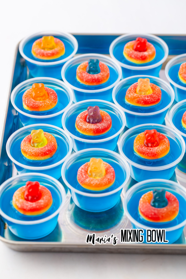 Pool Party Jello Shots with gummy bears and peach gummies