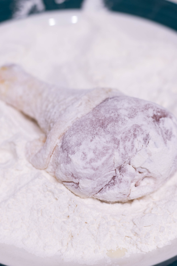 Closeup shot of drumstick in flour