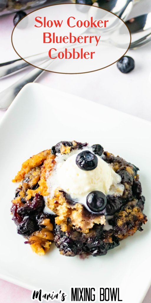 Slow Cooker Blueberry Cobbler on a square white plate