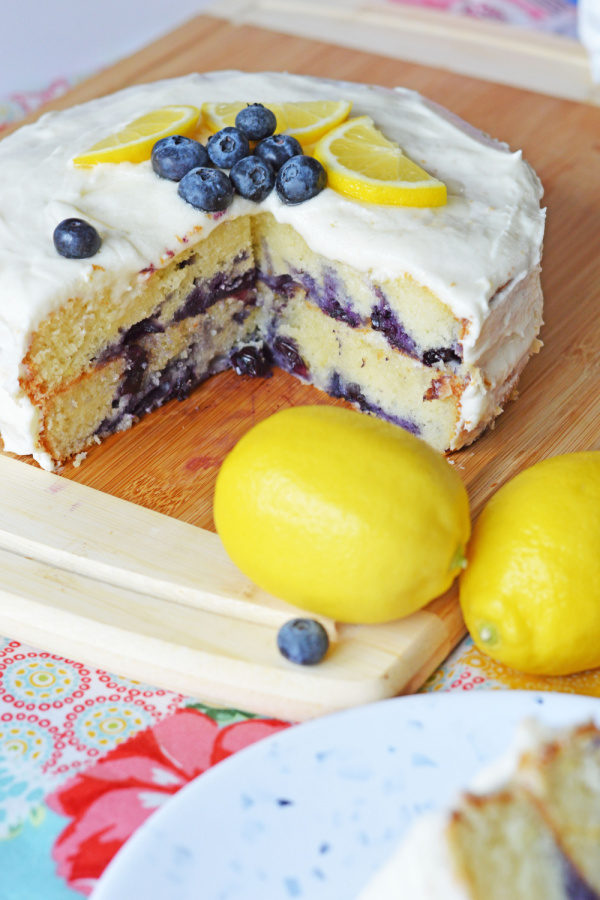 Lemon Blueberry Cake with lemon slices and blueberries on top